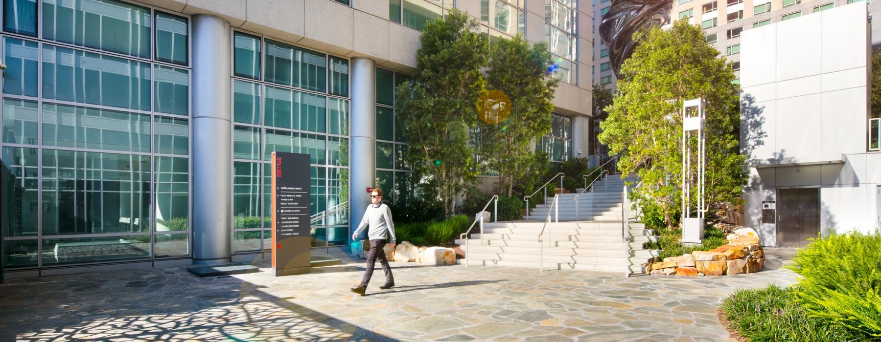 a person walking outside of a building